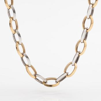 A 14K white and yellow gold necklace.