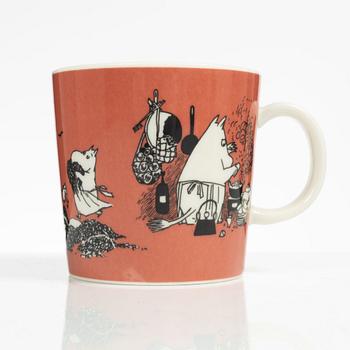 A Moomin mug, 'Dark rosa' with sticker, Arabia, Finland, 1991-99.