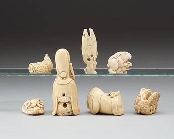 A set of six ivory netsukes and and Okimono, Japan, Meiji (1868-1912).