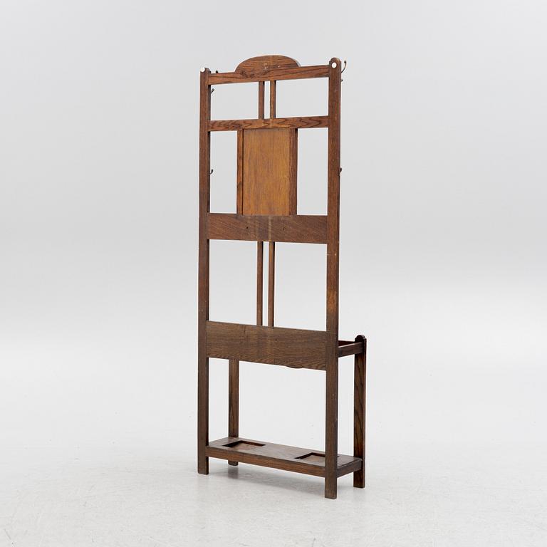 An oak coat hanger and umbrella stand, Early 20th century.