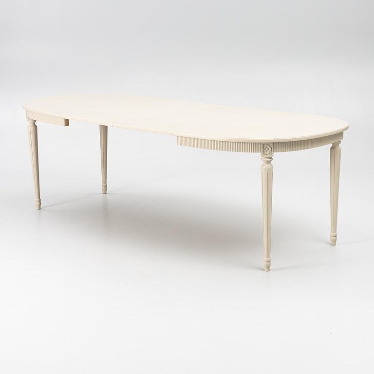 A dining table with 10 chairs, Gustavian Style dining suite, second half of the 20th century.