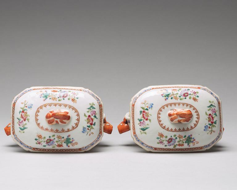 A pair of famille rose 'double peacock' butter tureens with covers and stands, Qing dynasty, Qianlong (1736-95).