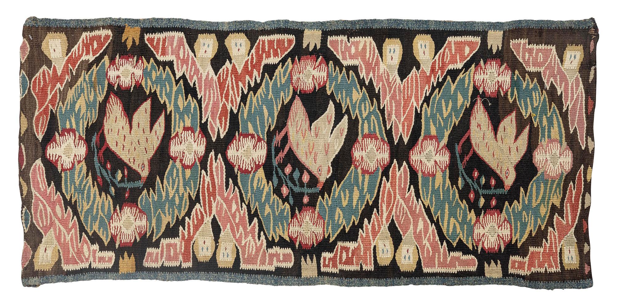 A carrige cushion, "Noaks duva" ('Noah's dove'), tapestry weave, c. 95.5 x 44 cm, Torna district, Southwestern Scania.