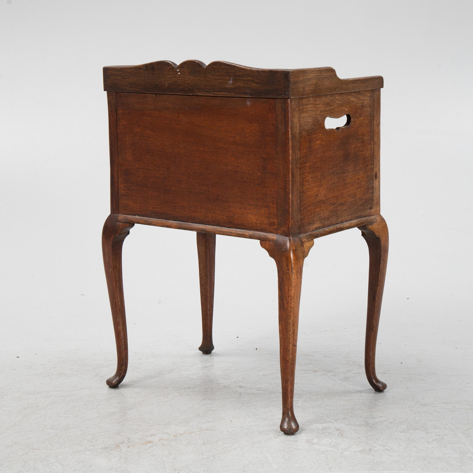 A rococo style bedside table, early 20th Century.