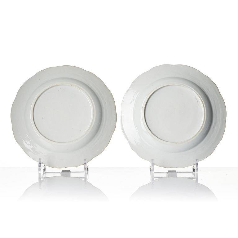 A pair of 'Chinese Export' armorial dinner plates, Qing dynasty, 1790's.