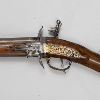 Flintlock rifle, double-barrel "wender" by Philippe de Sellier (1676-1740).