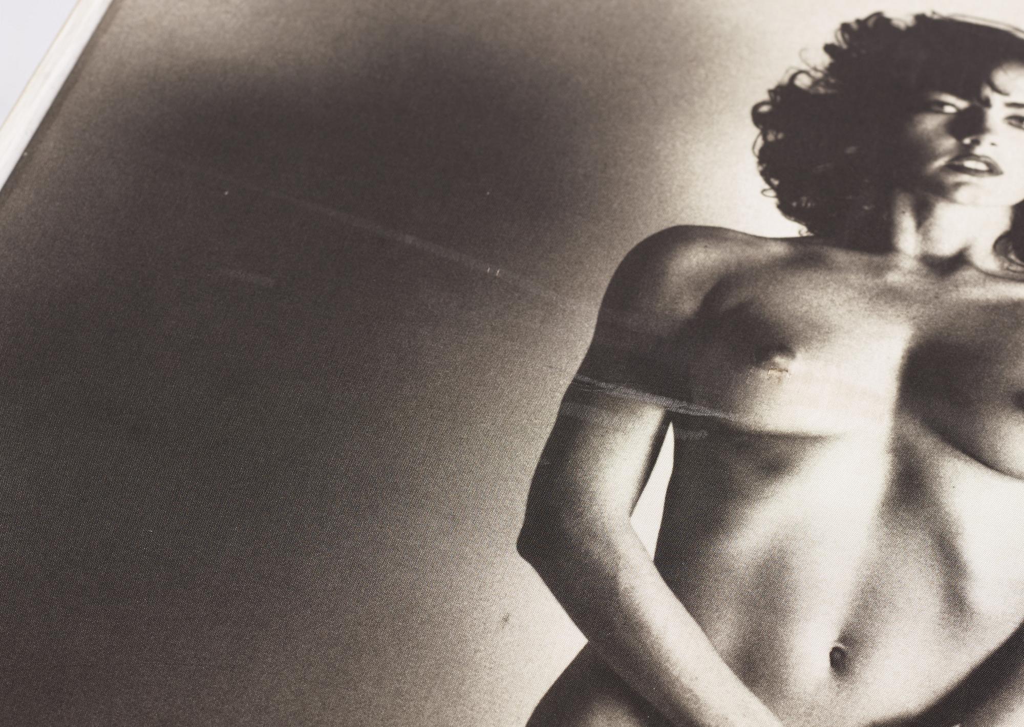 Helmut Newton, Signed book published by Taschen, Monte Carlo, 1999, ed 10000, with a metal table.