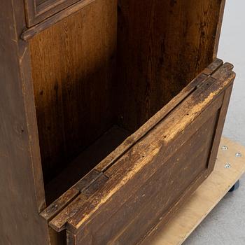 A wooden fire wood box, around 1900.