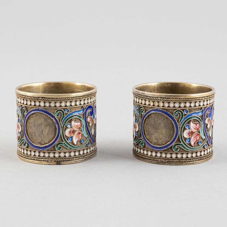 A Pair of Silver and Enamel Napkin Rings and Spoon, Russia 1896-1926.