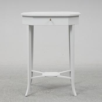 A ladys working table 20 th century.