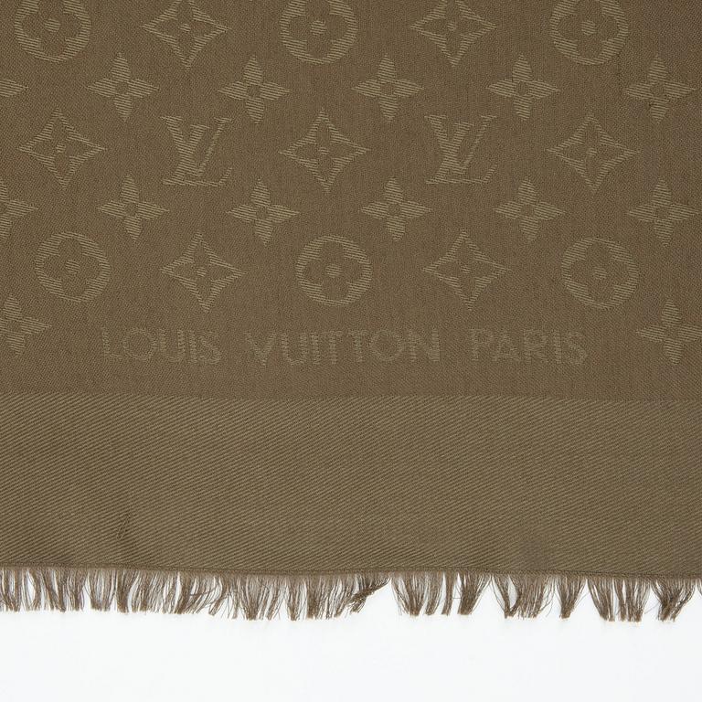 LOUIS VUITTON, a olive green monogrammed wool and silk shawl.