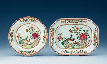 1442. A famille rose 'double peacook' serving dish and a dinner plate. Qing dynasty, Qianlong (1736-95).