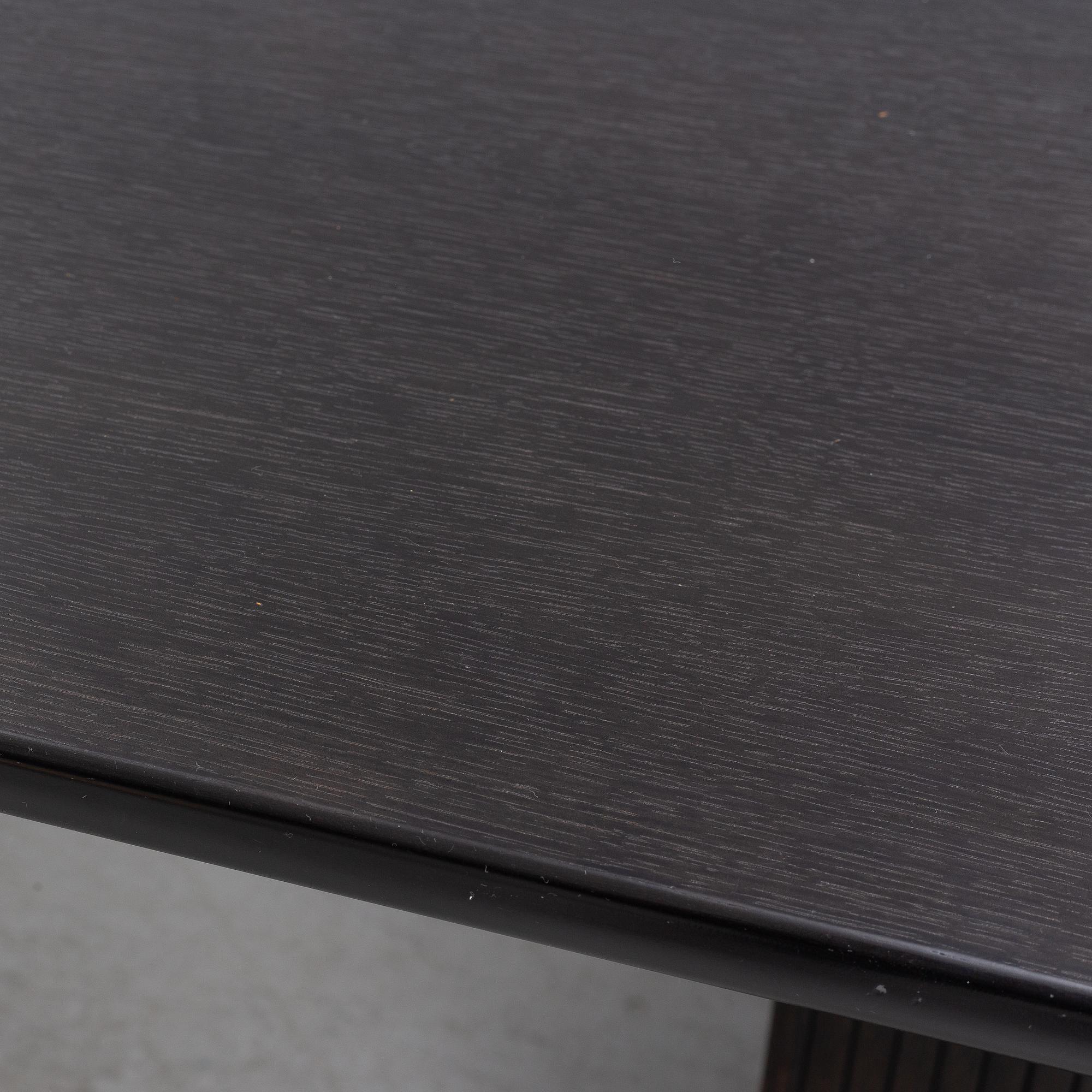 Space Copenhagen, a 'Moon' dining table, Gubi, Denmark.