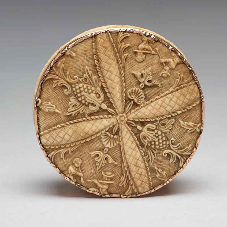 A 17th century bone and gold snuff-box.