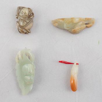 A group of eight Chinese stone charms, 20th century.