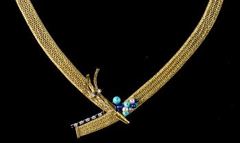 A gold and precious stones necklace. 1950's.