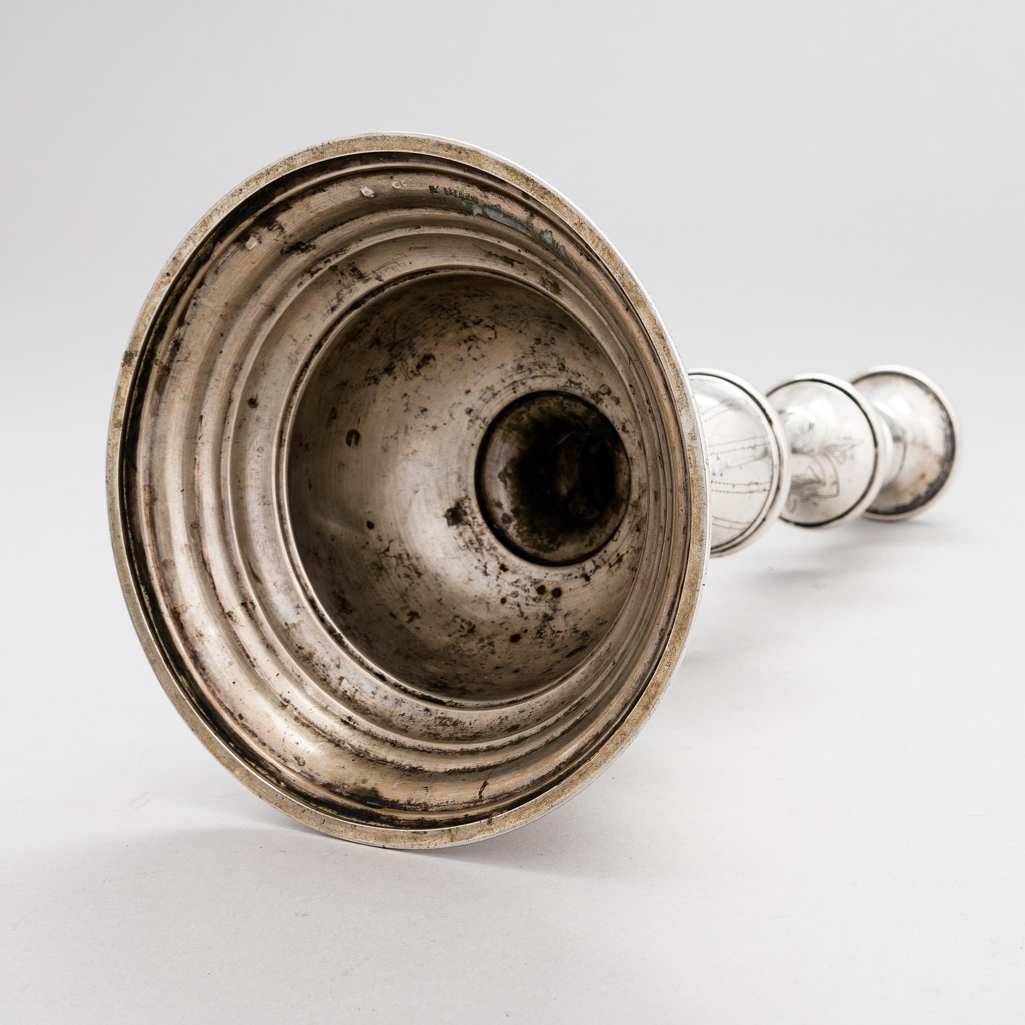 A Viennese silver candlestick, maker's mark CW, Austro-Hungarian Empire 1872-1922.