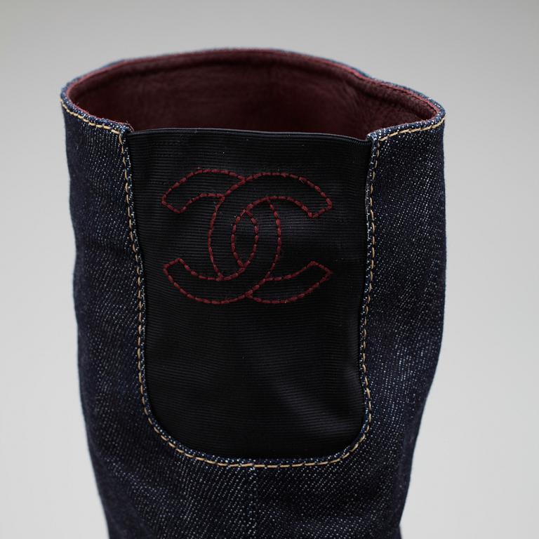 CHANEL, a pair of jeans fabric boots.