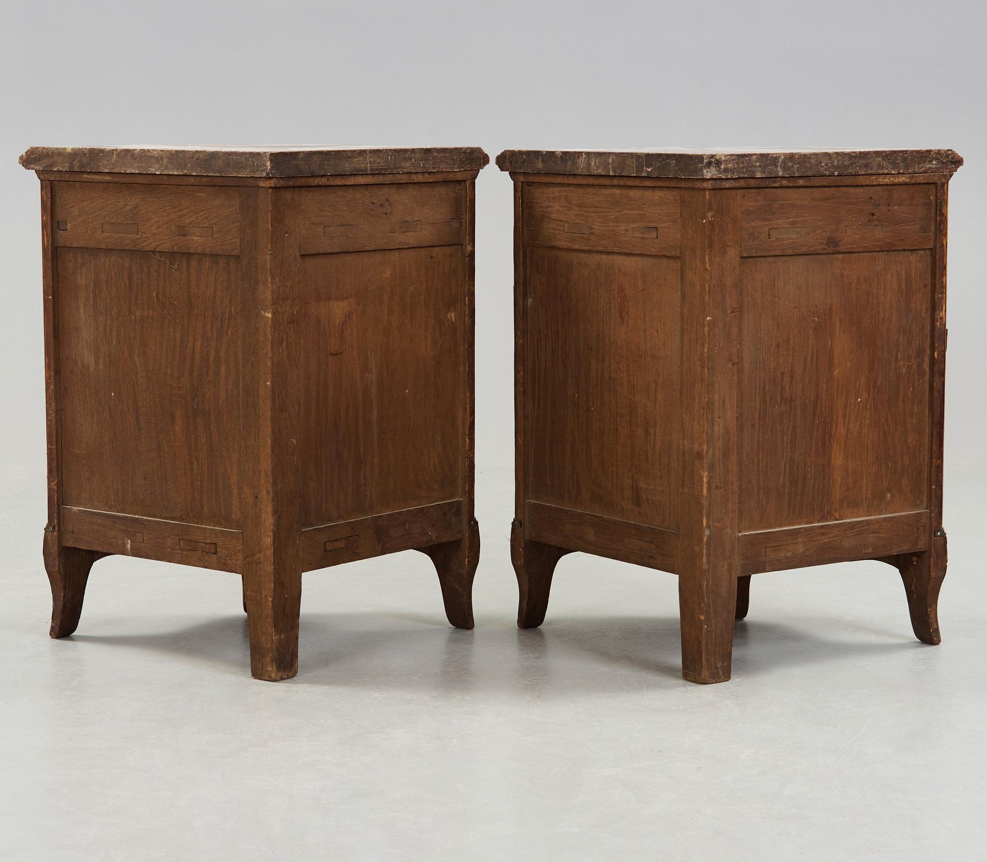 A pair of Louis XV 18th century corner cupboards.