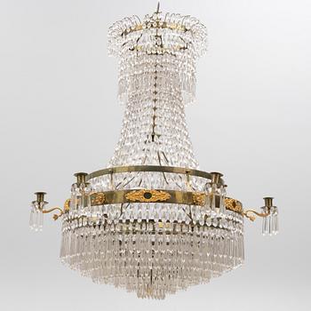 A Swedish Empire-style brass and cut glass seven-light chandelier, 19th century.