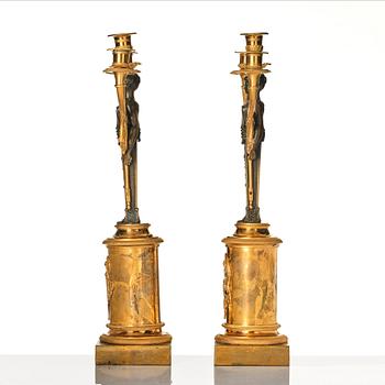 A pair of Swedish empire candelabra, attributed to R F Lindroth.