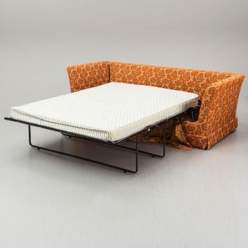 A contemporary sofa bed.