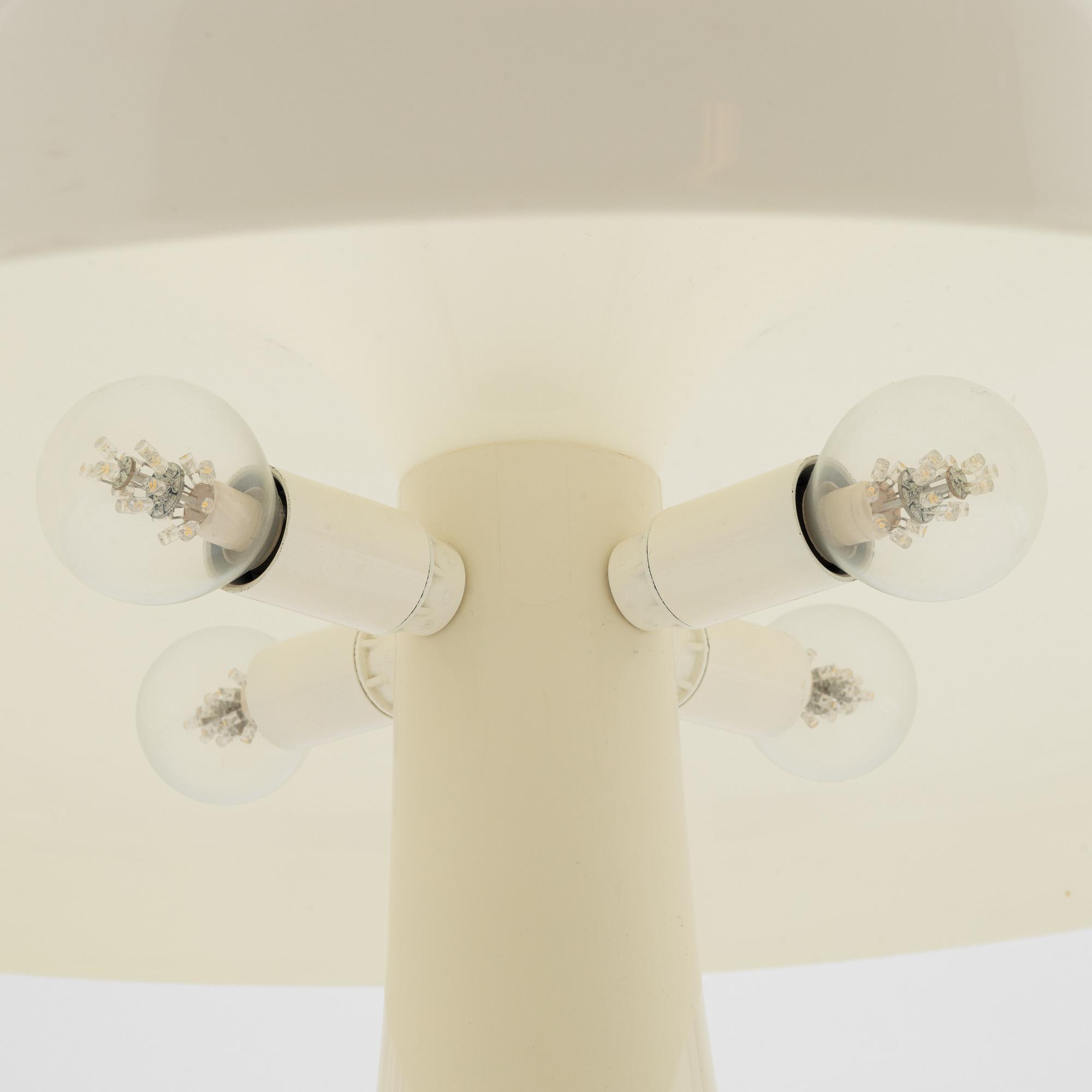 Giancarlo Mattiolo, a 'Nesso' table lamp, Artimide.