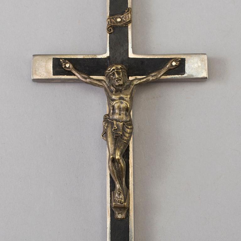 AN ART DÉCO PEWTER AND WOOD CRUCIFIX, 1930s.