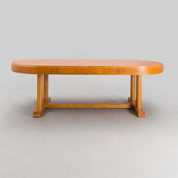 A mid 20th century dining table.