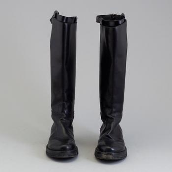 a pair of Ann Demeulemeester, "Vitello Lucido Nero Riding Boots". Size 38.