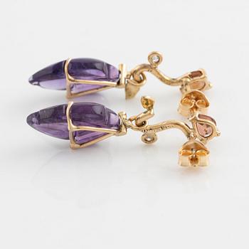 Carved amethyst, tourmaline and brilliant cut diamond earrings.