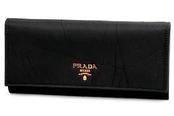 PLÅNBOK, Prada.
