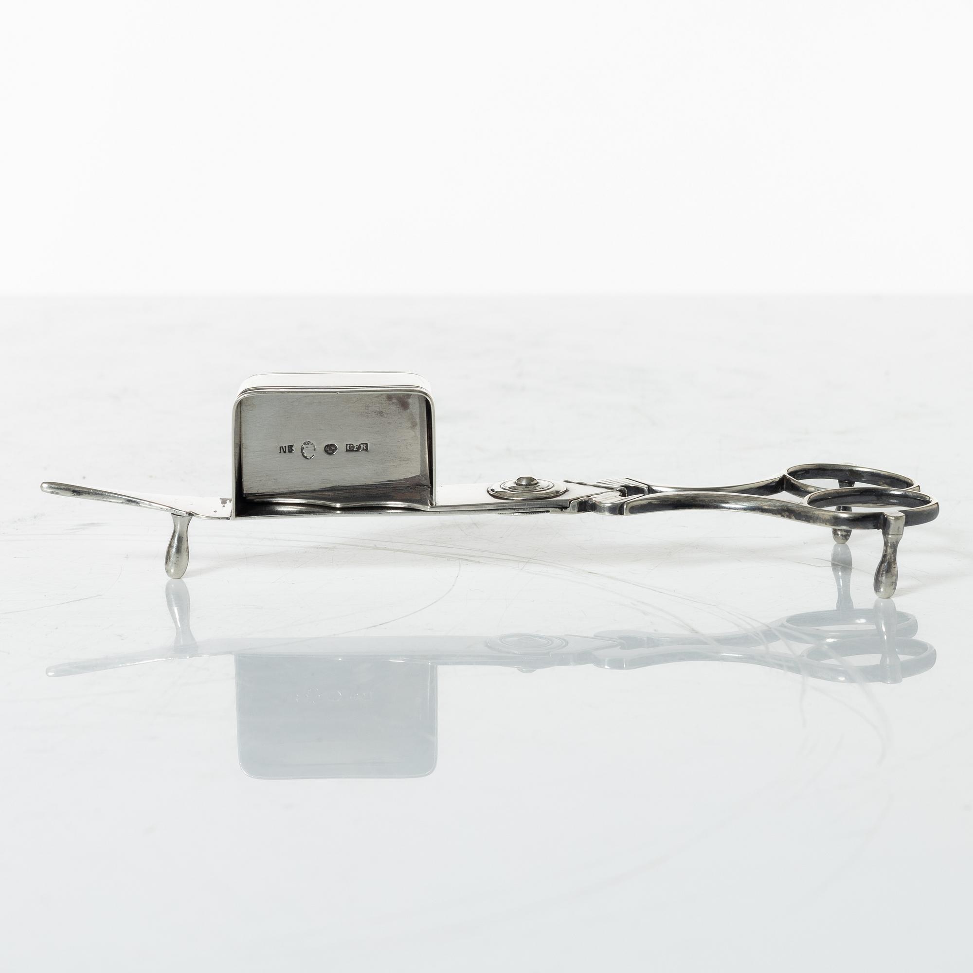 A Swedish Empire silver candle snuffer and tray, Stockholm 1818-1819.