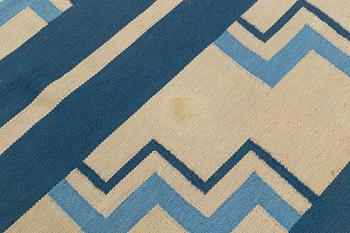A flat weave carpet, Sweden, dated 1936, c. 370 x 260 cm.