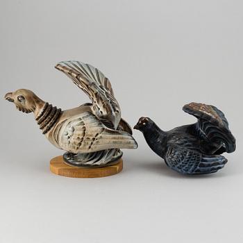 GUNNAR NYLUND, two stoneware sculptures of capercailles, Rörstrand, Sweden.