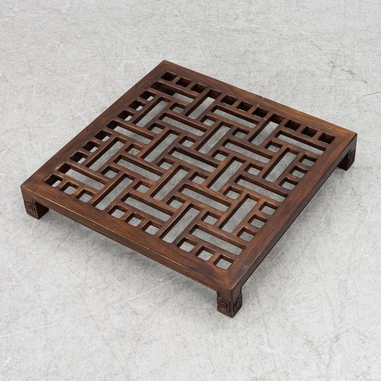 A Chinese hardwood folding chair, 20th century.