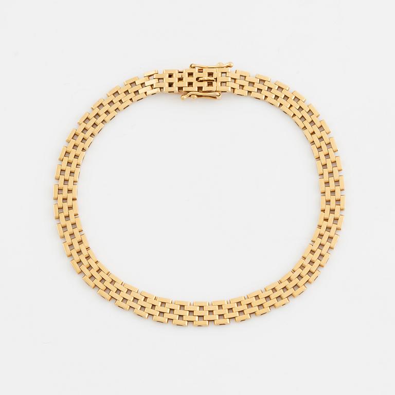 18K gold bracelet.
