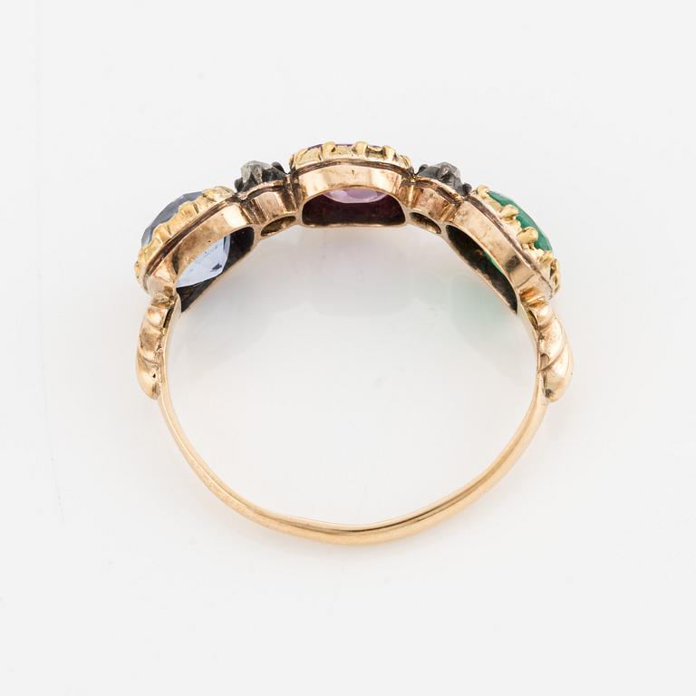 Ring in 18K gold with likely synthetic ruby, sapphire, emerald, and old-cut diamonds.