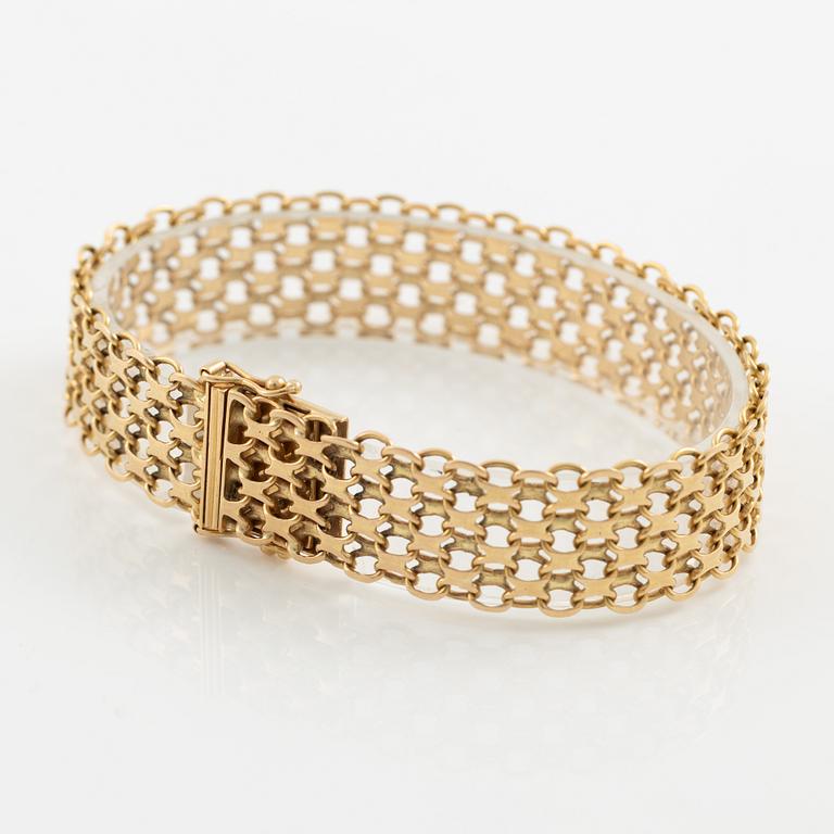 Arm bracelet, 18K gold, x-link.