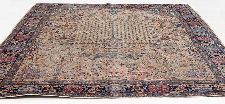 An oriental carpet, circa 350 x 295 cm.