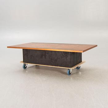 A 1970s copper coffee table.