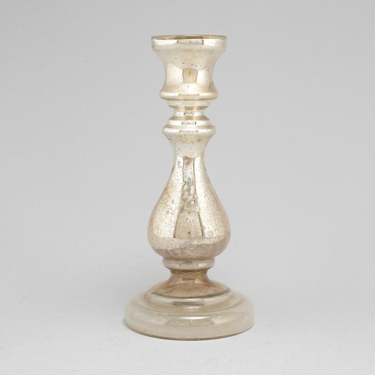 A 19th century glass candlestick.
