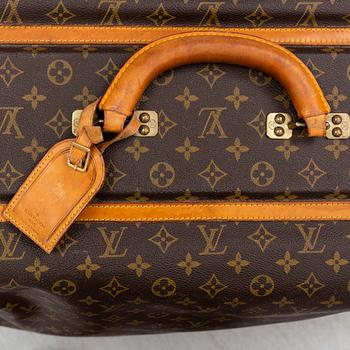 LOUIS VUITTON, a monogram canvas garment bag.