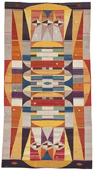 233. A CARPET, flat weave, ca 449 x 242,5 cm, signed MG, dated 1969.