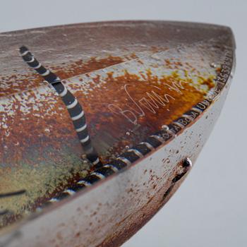 Bertil Vallien, a sand cast glass sculpture of a boat, Kosta Boda, Sweden.