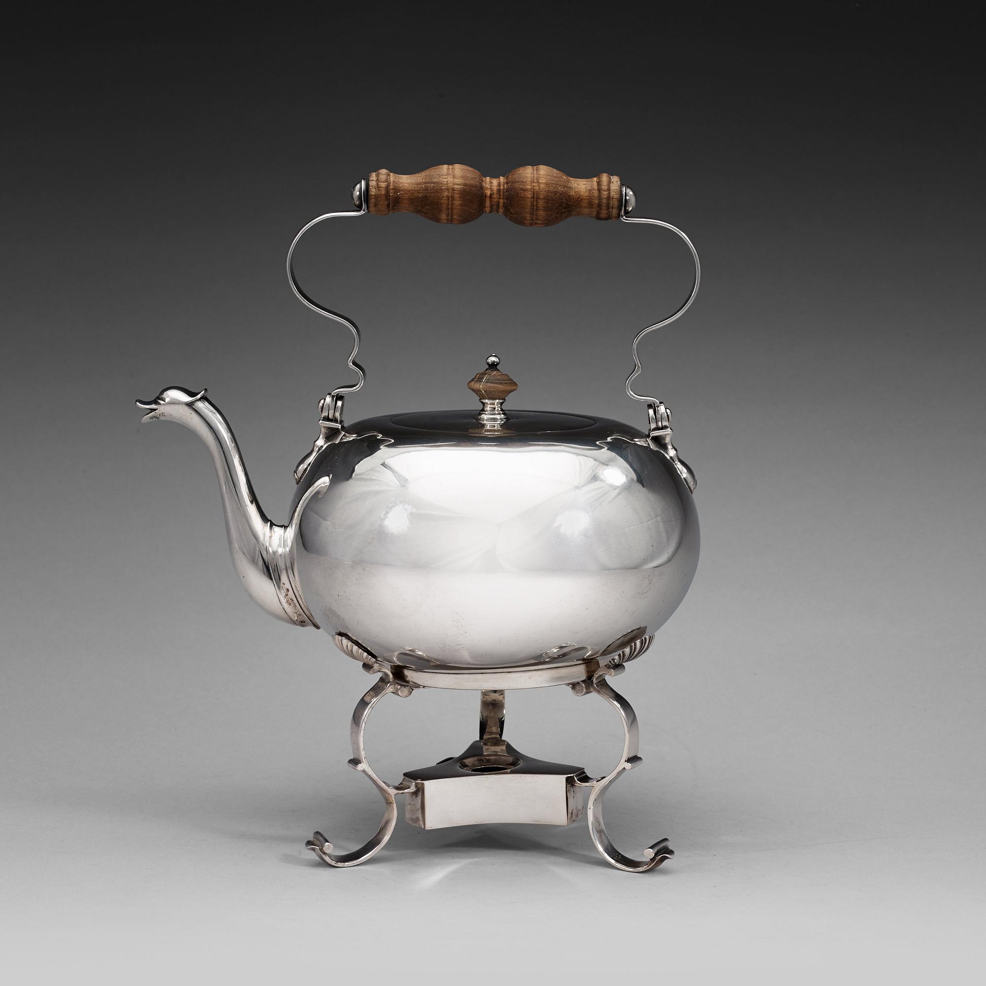 A Baltic 18th century silver tea-pot and stand, marks of Andreas Gabriel Berg, Dorpat (1735-1764).