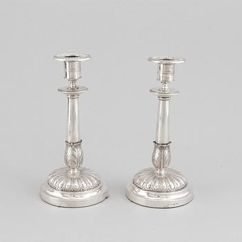 Gustaf Möllenborg, a pair of silver empire candlesticks, Stockholm 1829.