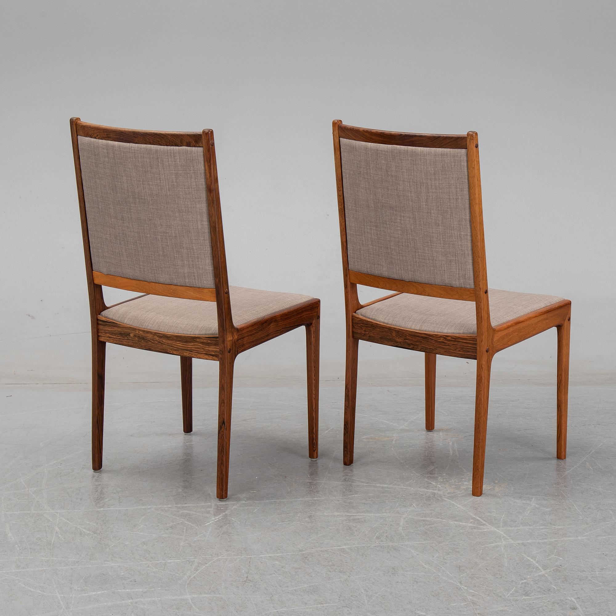 A seven-piece rosewood dining suite, 1960's/70's.