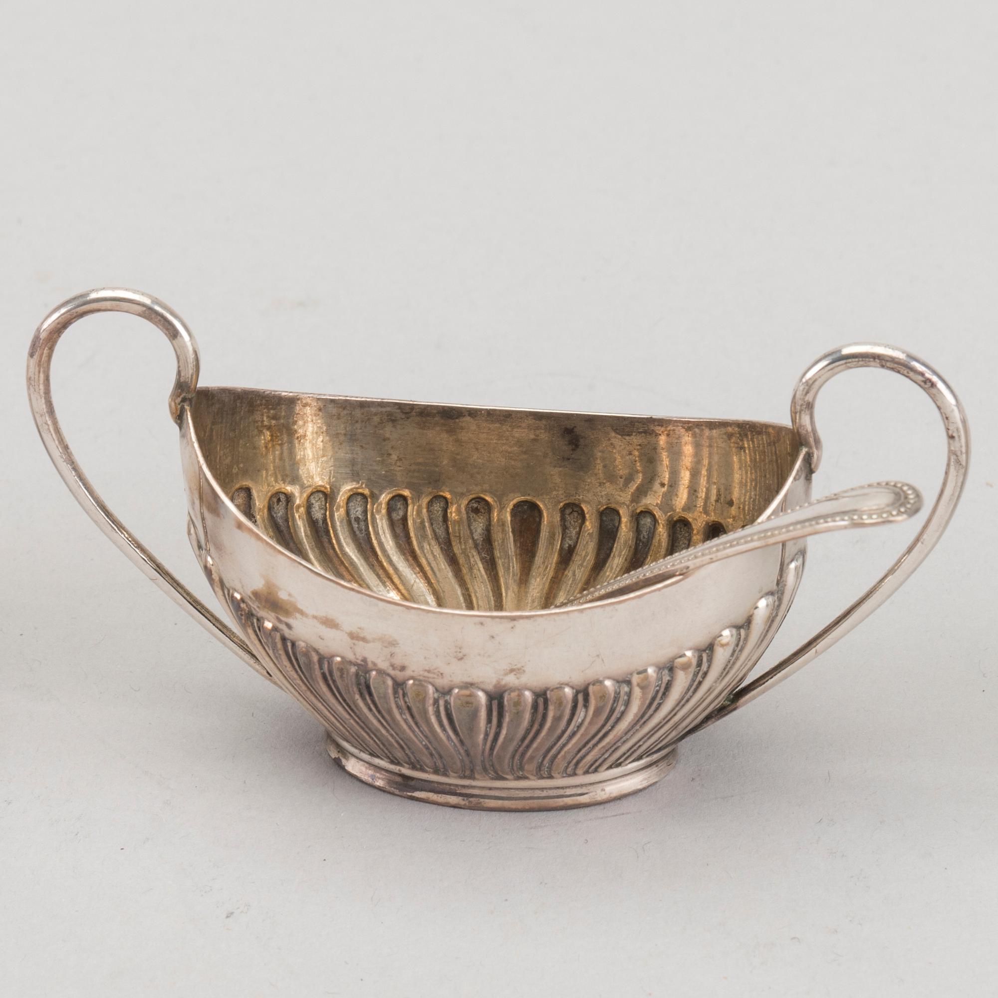 An English set of four silver salters with spoons mark of James Dixon & sons Sheffield 1895, weight 166 gr.