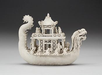 A white bisciut Dragon Boat, 19th Century.